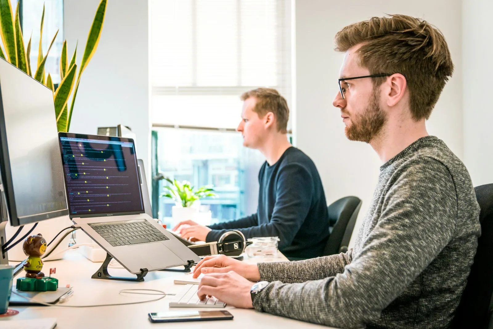 IT professionals collaborating in a modern business office